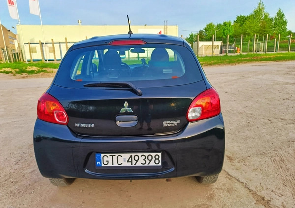 Mitsubishi Space Star cena 16000 przebieg: 147800, rok produkcji 2014 z Tczew małe 121